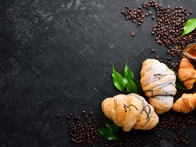 breakfast-fresh-chocolate-croissant-black-stone-background-top-view-free-space-your-text-min